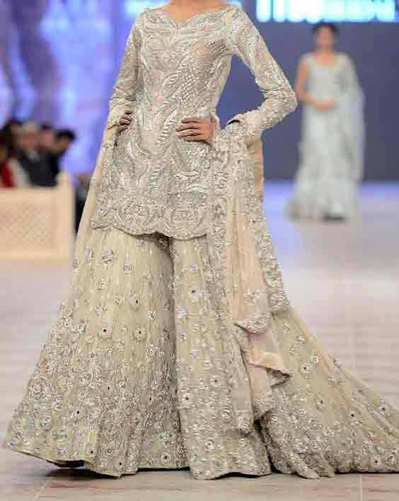 Silver short shirt with sharara ans dupatta for engagement