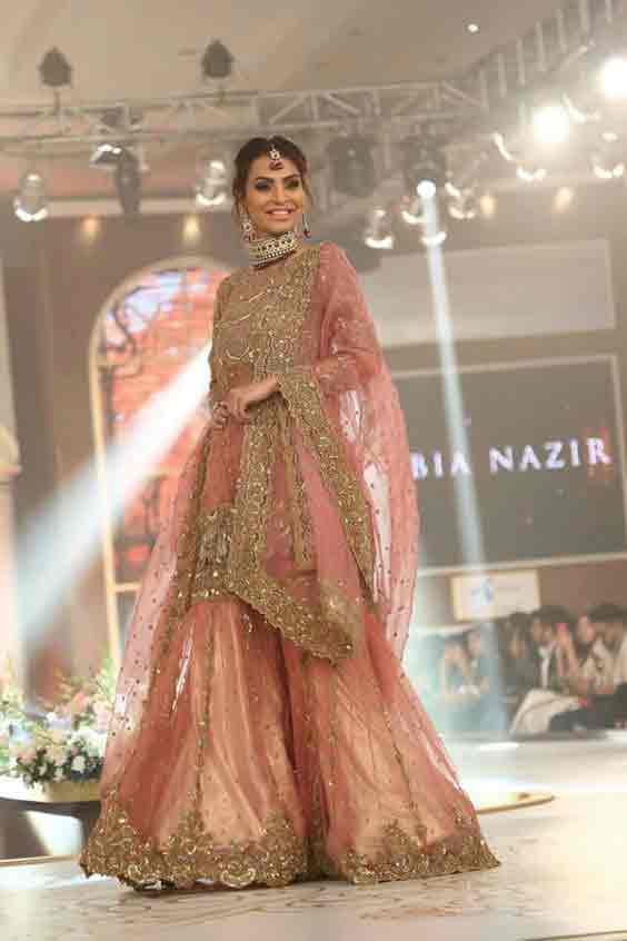 Pink short shirt with sharara for Pakistani engagement brides