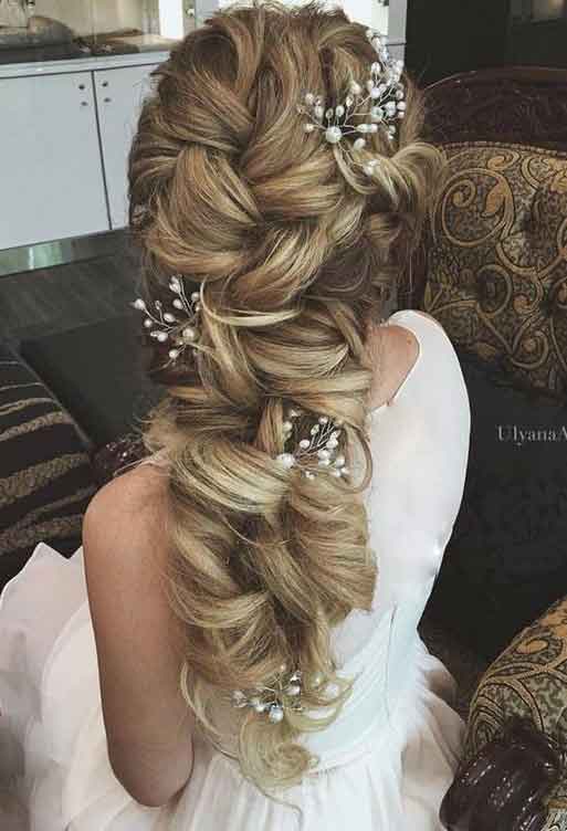 Latest Twisted waves hairstyle with accessories for brides