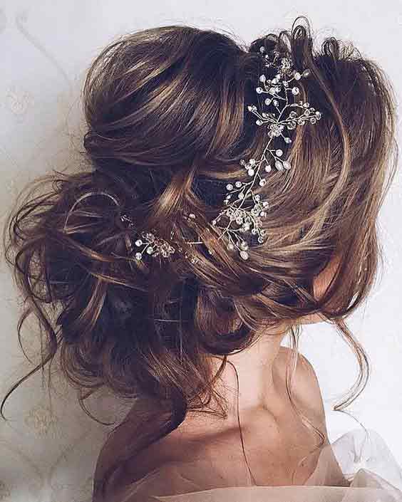 Low bun with a bump hairstyle for brides