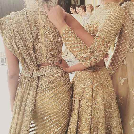 Golden bridal saree details in Pakistan