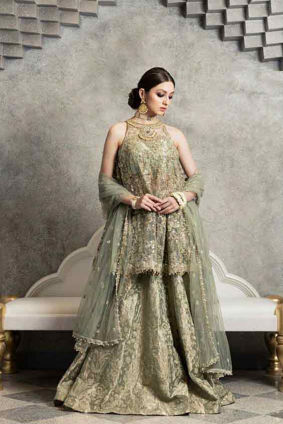 Pakistani green peplum dress with lehenga for wedding brides