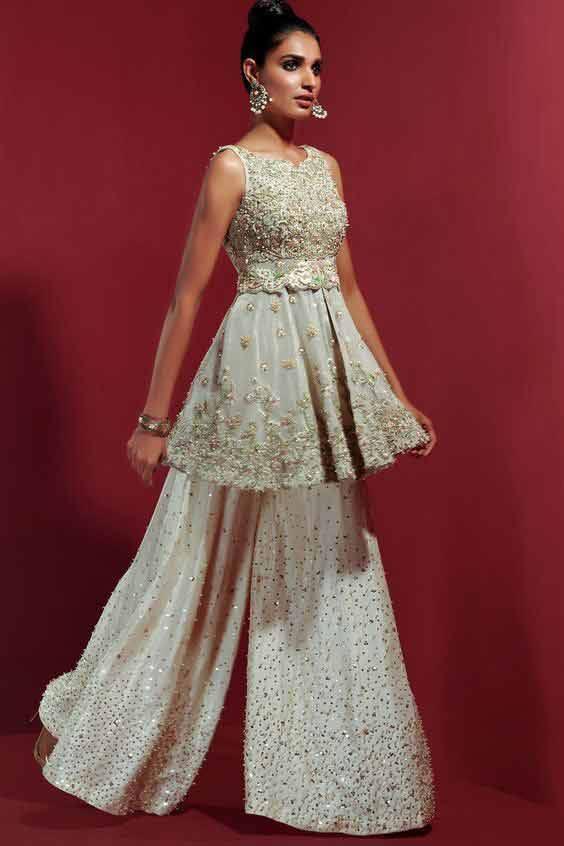 Latest white Pakistani peplum dress for brides