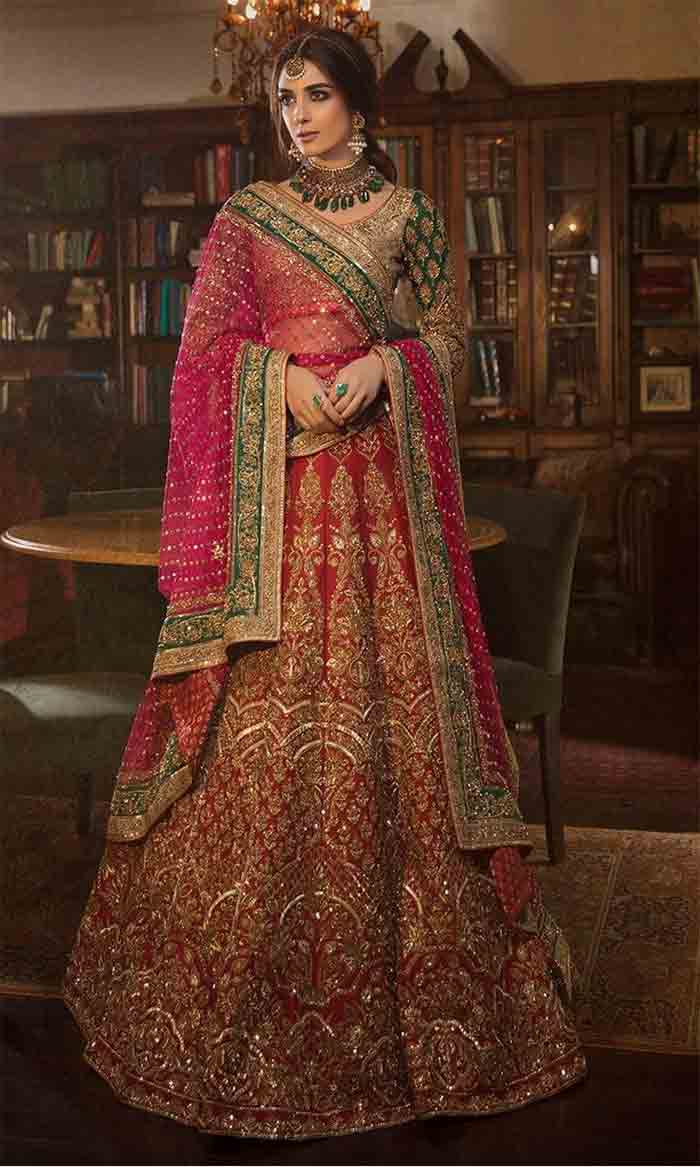 Red and pink crop top choli wit lehenga for bridals