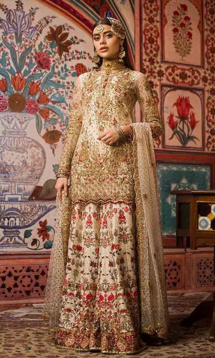 Pakistani bridal off-white kurti with lehenga