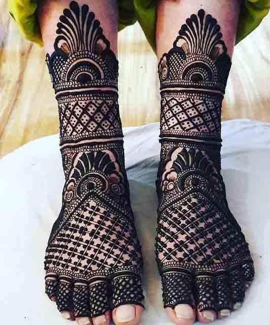 Dark full mehndi style for foot and legs