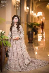 Beautiful pink long frock for Pakistani engagement bride