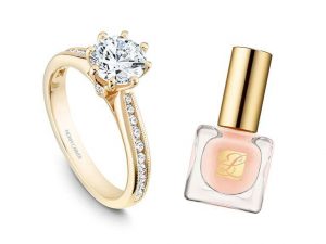 Yellow gold ring with pink nail polish for engagement