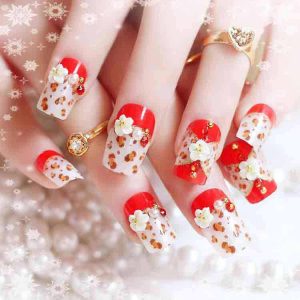 Pakistani red and white engagement nail art