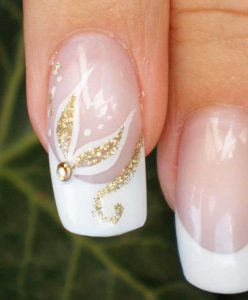 Latest white and golden floral engagement nail art