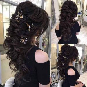 Twisted loose braided hairstyle with hair accessories