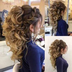 Braided hairstyle with loose curls for engagement brides