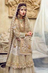 Beautiful golden peplum dresses for Pakistani brides