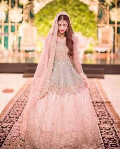 Pakistani Pink peplum frock with lehenga for wedding brides
